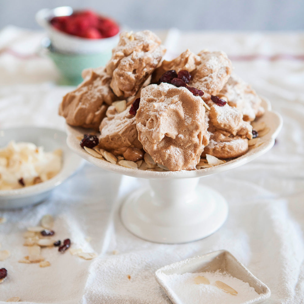 Red meringues with cranberries and almonds