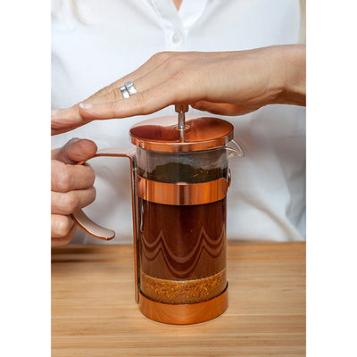ground rooibos in a french press appliance